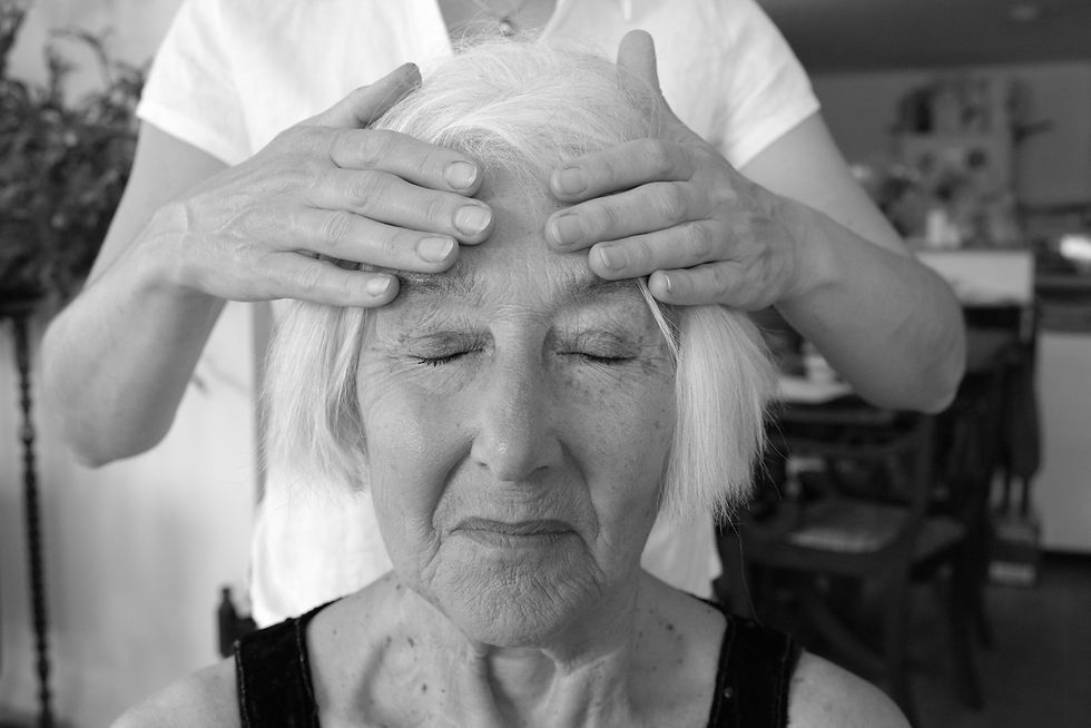 Julia treating a patient in her clinic in east sussex