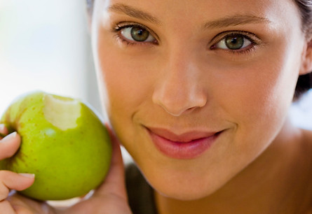 Girl Eating an Apple