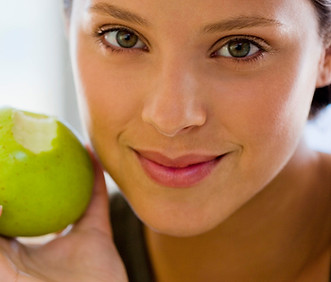 Girl Eating an Apple