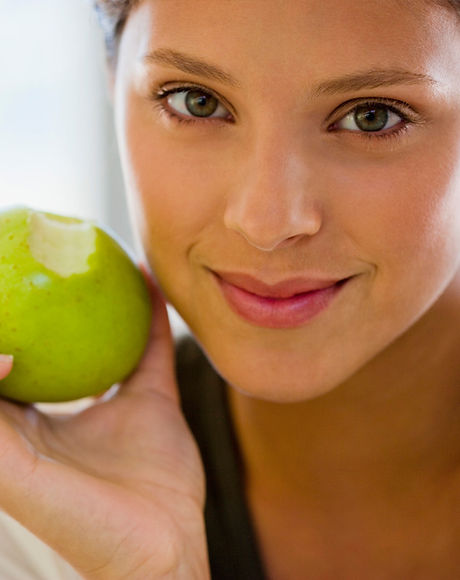 Girl Eating an Apple