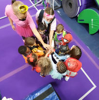 Team huddle for Halloween