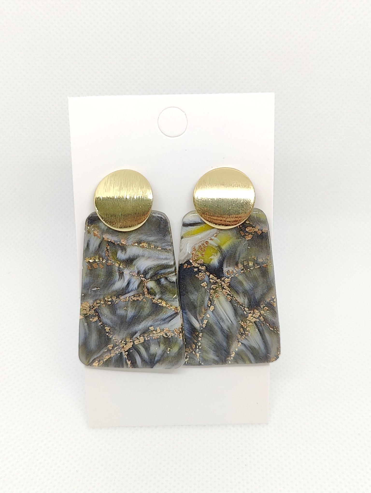 Hangers zwart/geel/wit met detail in goud