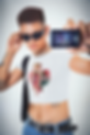 bella-canvas-crop-top-mockup-featuring-a-man-taking-a-selfie-with-an-old-camera-m31200.png