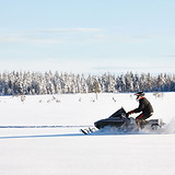 Snowmobile plowing