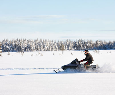 Snowmobile plowing