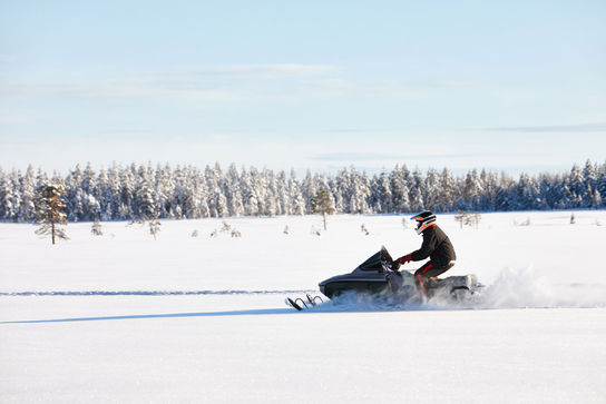 Snowmobile plowing