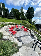 Armour stone installation creating a firepit in Shanty Bay, ON