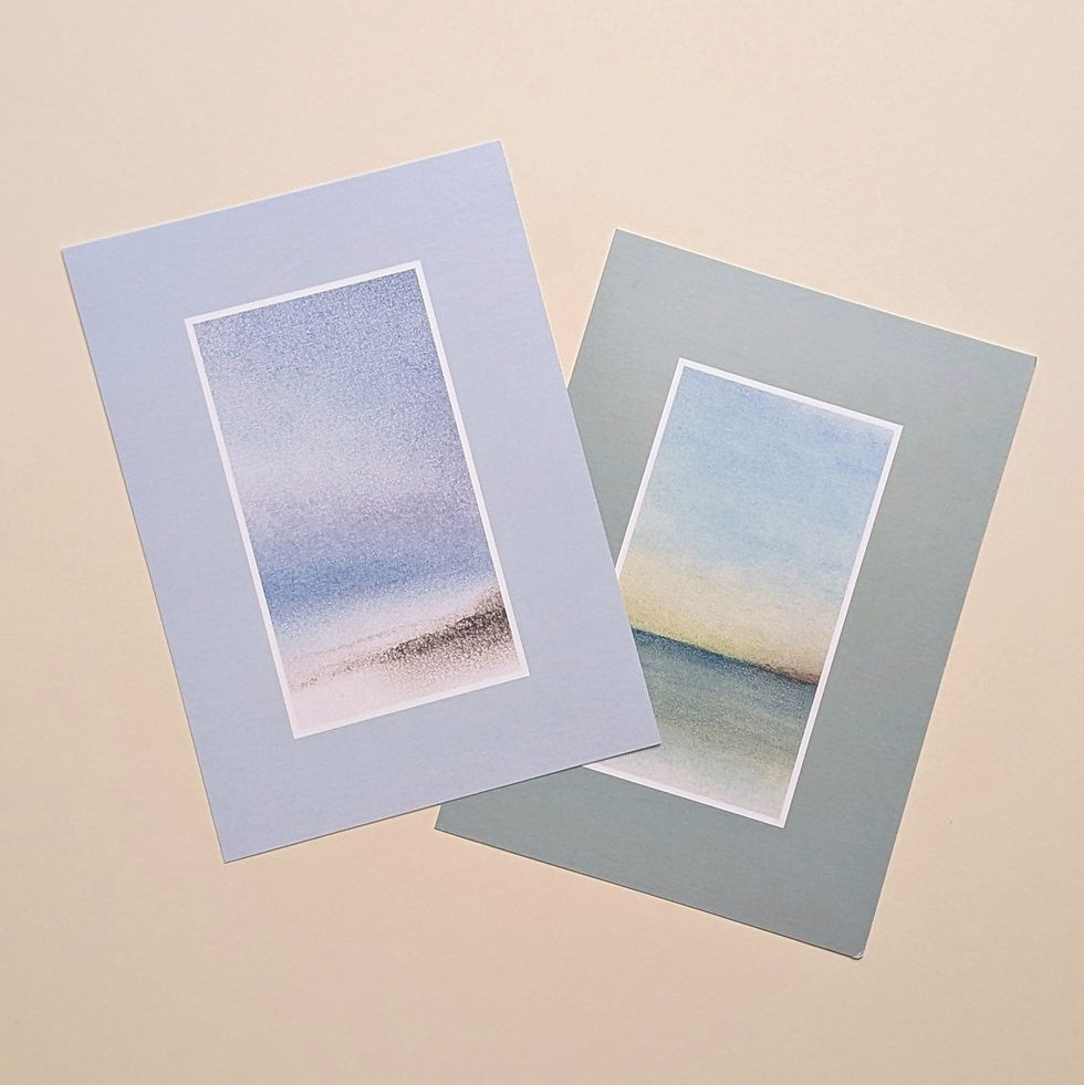 two art prints of Scottish seascapes against a cream background