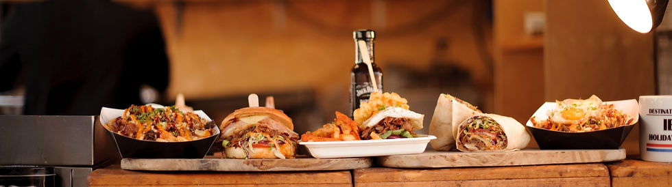 Festival street food lined up on vintage crates.
