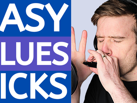 Man playing harmonica, wearing headphones, eyed closed. Text: easy blues licks