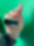Side view of hand holding diatonic harmonica