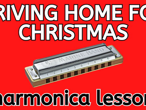 A photograph of a diatonic harmonica in front of red background with text that reads Driving Home for Christmas harmonica lesson