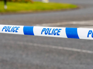 Woman Dies in Irvine as Police Close Road and Urge Public to Avoid Area
