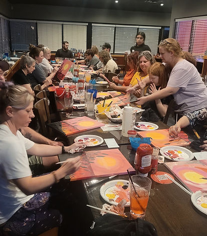 Paint night picture of a party