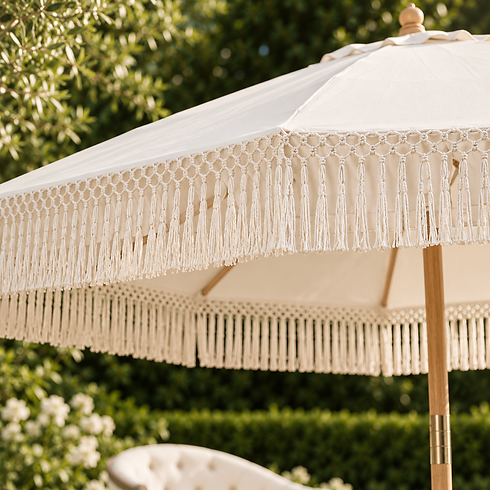 Macramé fringe detail on cream wedding parasol for hire