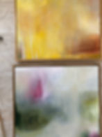 Two abstract paintings: warm yellow and cool green with pink