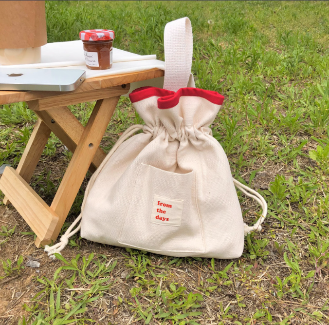 Thumbnail: Red canvas drawstring bag front view