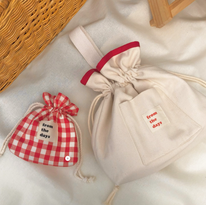 Thumbnail: Red canvas drawstring bag front view