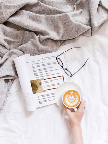 this isn't the life i prayed for open on bed with coffee and glasses