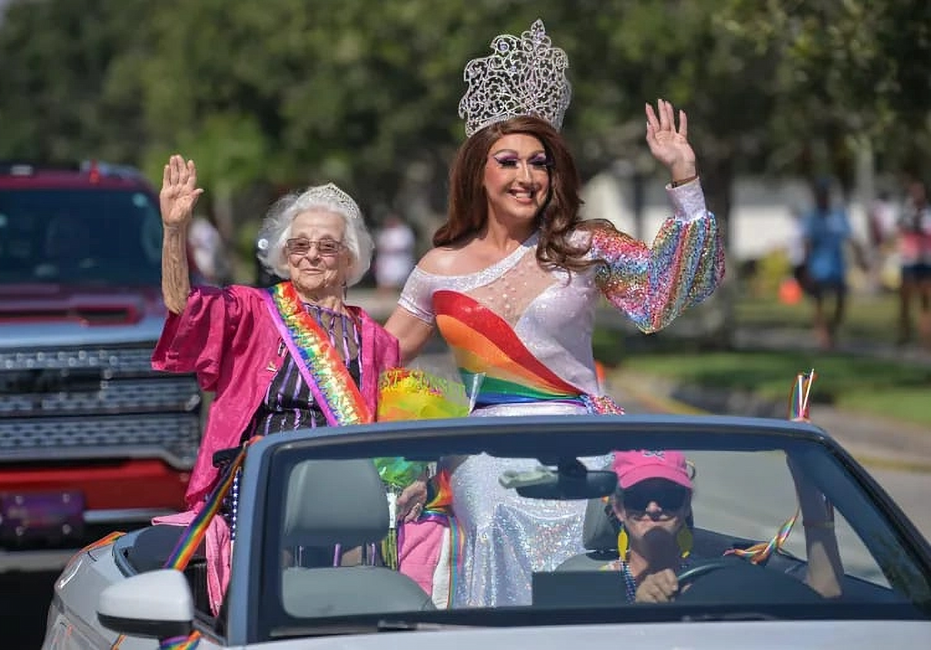 Showing support for the LGBTQ+ by appearing in the parade