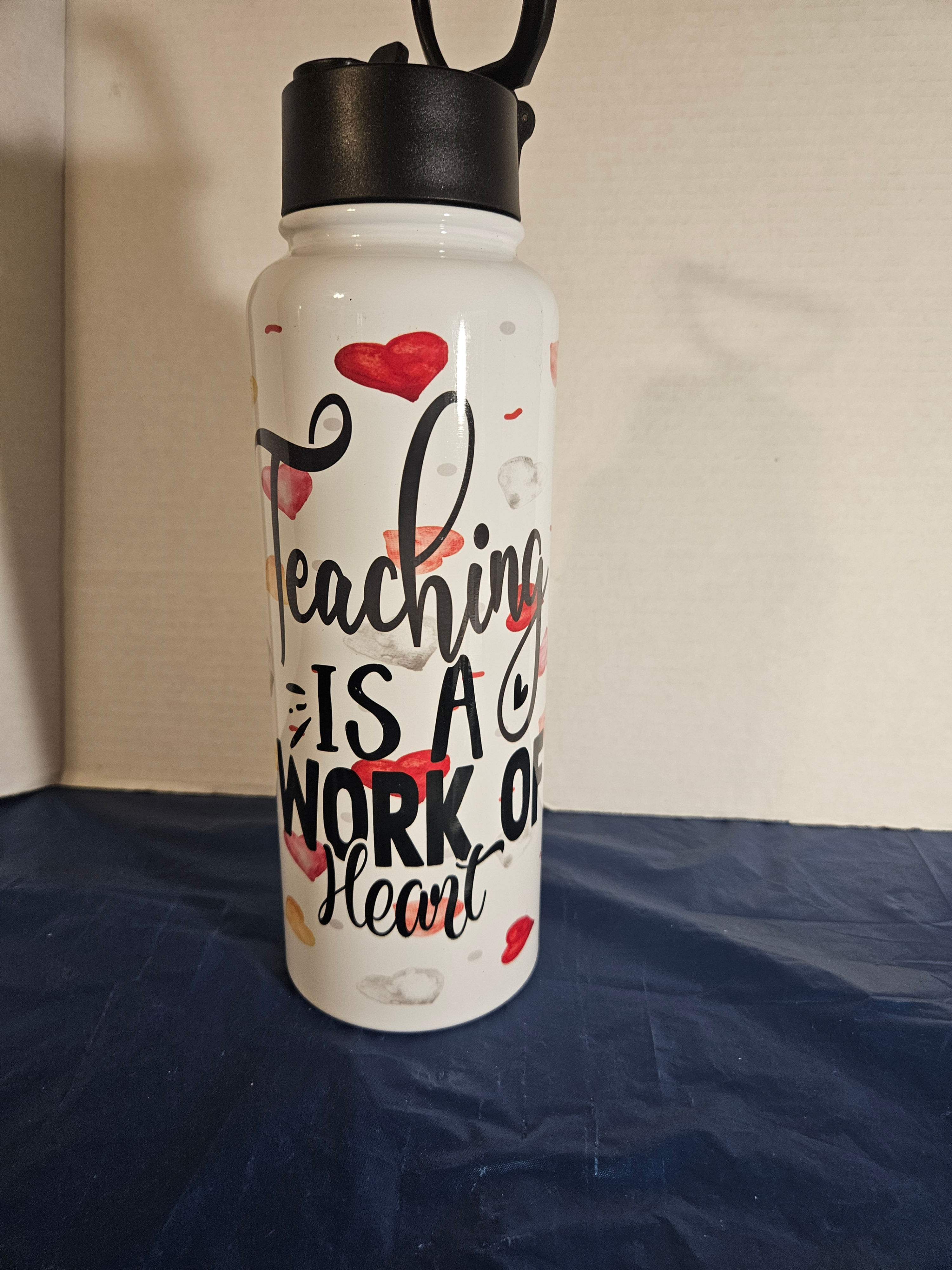 Teaching is a work of the heart 40 oz water bottle