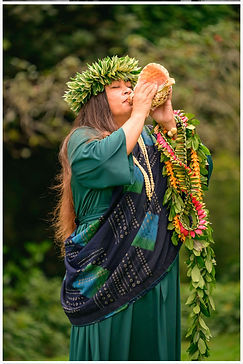 Michaela Blowing the Conch.jpg