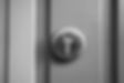 close Image of a keyed lock on a door