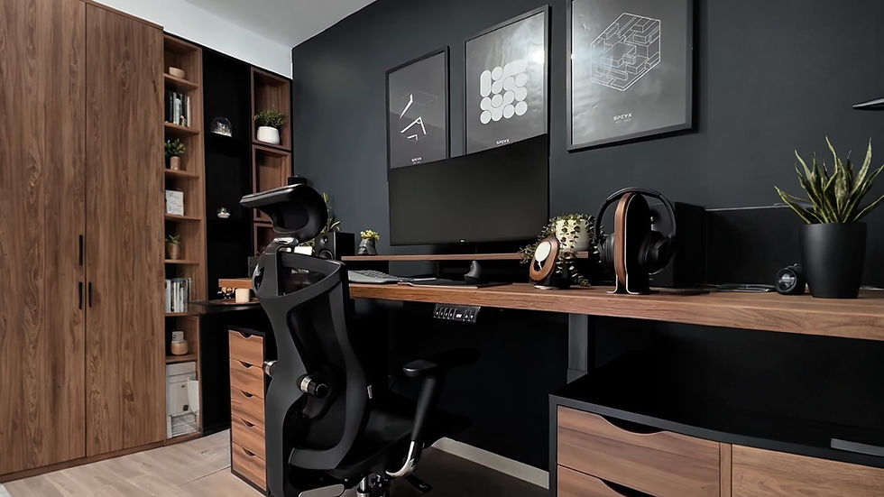 Sleek terracotta-inspired home office desk setup with ergonomic chair, walnut finish, and dark matte walls.