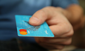 Hand Holding Credit Card