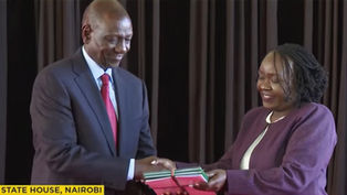KNCHR Chairperson handing the report over to the President of the Republic