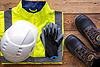 builder-uniform-wooden-background-flat-lay.jpg