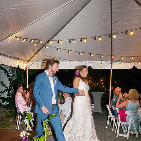 The newlyweds are announced at their reception at their destination wedding at the Feather Leaf Inn, a Caribbean eco-hotel. 