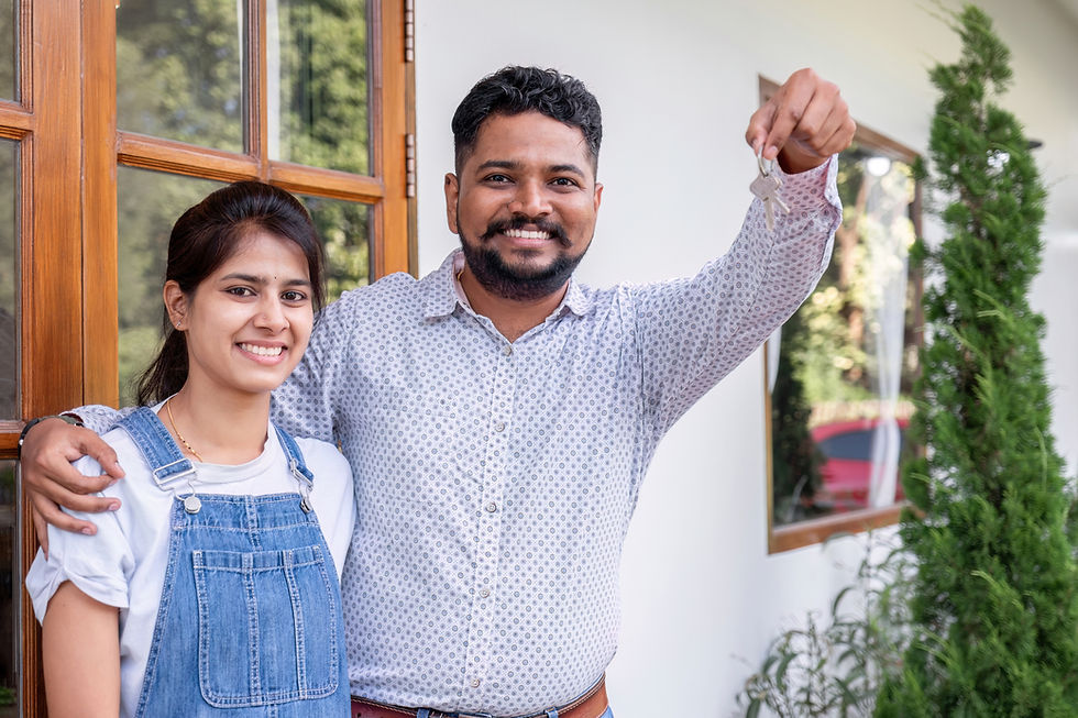 happy-couple-showing-keys-for-their-new-home-happ-2023-11-27-05-25-30-utc.jpg