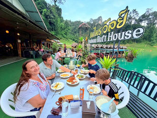 Guests having breakfast at Praiwan Rafthouse on Cheow Lan Lake