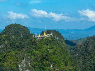 Wat Tham Sua The surrounding area is covered with large trees hundreds of years old