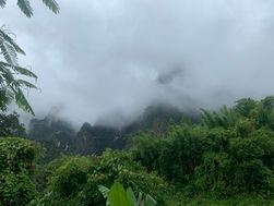Low clouds and mist covering the limestone mountains of Khao Sok