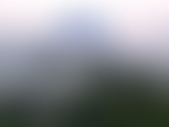 Morning mist over Khao Sok National Park rainforest in Southern Thailand