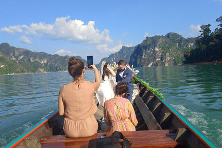 Not a hotel ballroom. Not a crowded beach. This is a private floating ceremony in untouched nature — peaceful, cinematic, and deeply meaningful.