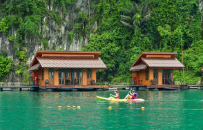 Guests swimming and relaxing at Panvaree Resort on Cheow Lan Lake