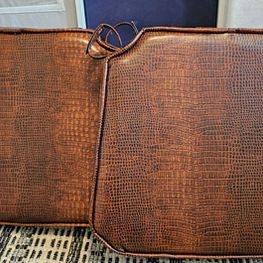 Reupholstered outside chair cushions.