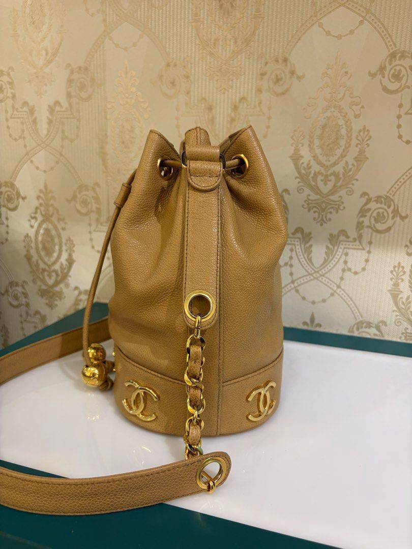 Thumbnail: Chanel Vintage CC Around Bucket Bag Dark Beige Caviar 24K Gold