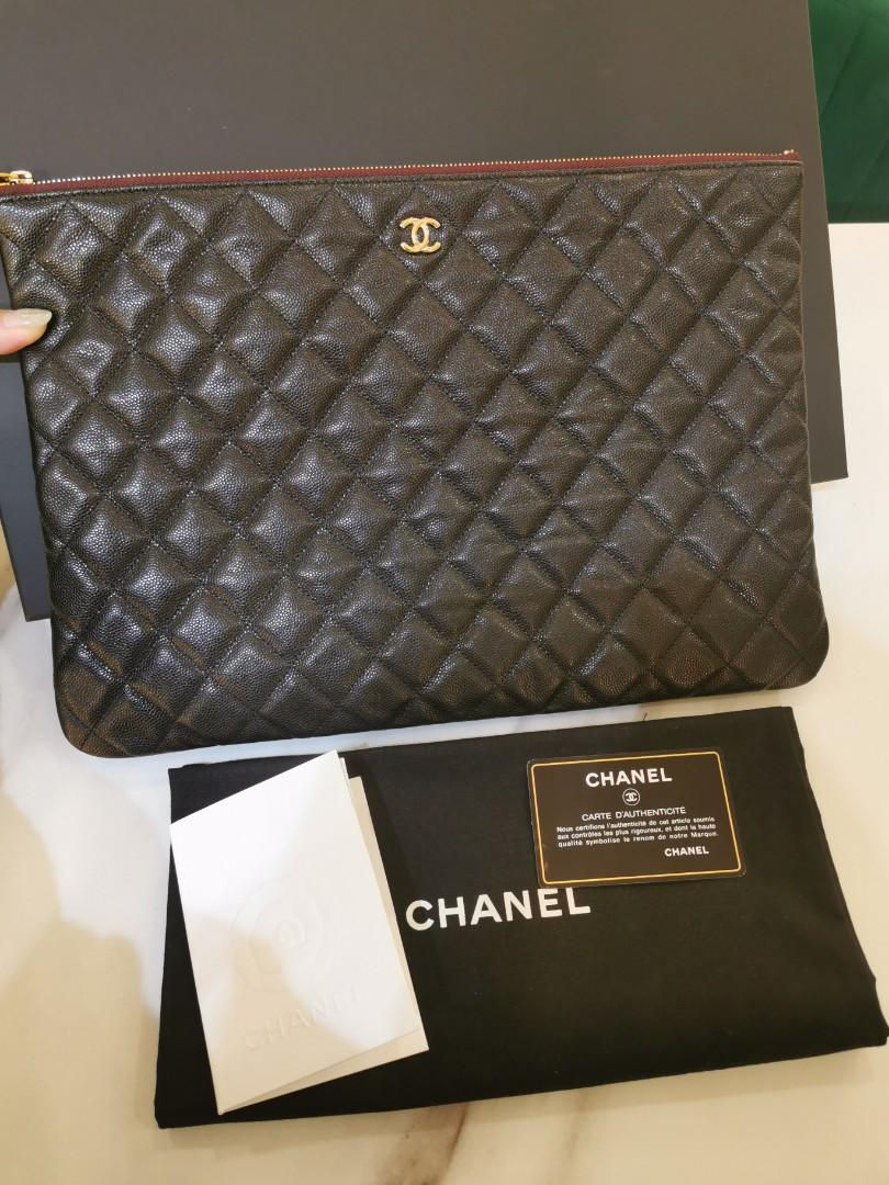 #29 LNIB Chanel O Case Clutch Black Caviar GHW