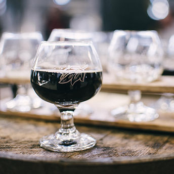 A glass of smoked beer on a YYC beer tour 