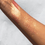 Thumbnail: SUN GLOW FACE & BODY HIGHLIGHTER (003, SPICY HUE)