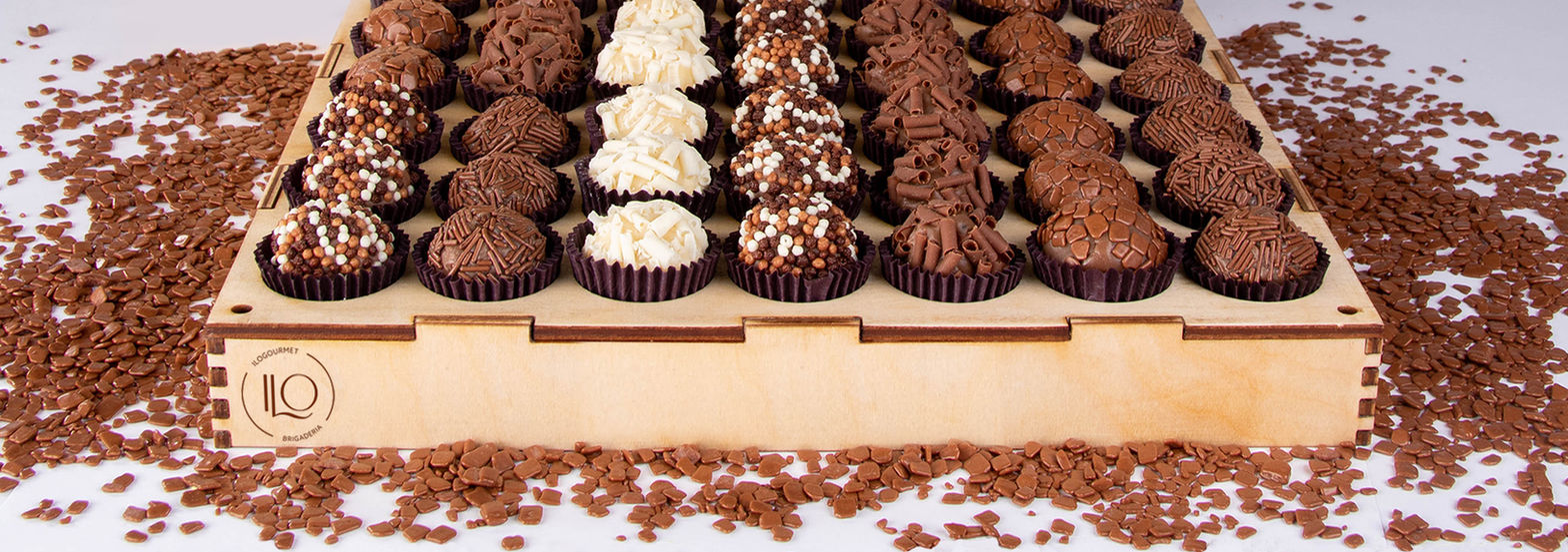 wooden tray with brigadeiro assortments