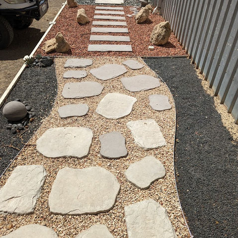 Complete Pathway and Paving Kits with stepping stones and decorative gravel, available in 20sqm and 10sqm sizes for garden and side-yard projects.