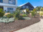 High angle view of beautifully landscaped garden with pathways