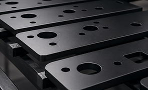 Blackened steel plates with a uniform dark conversion finish