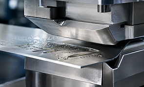 Metal forming press shaping a lubricated steel component