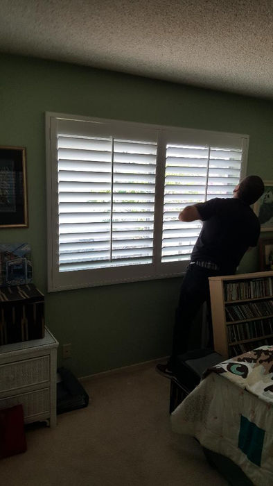 Low-maintenance vinyl shutters for durable and stylish window treatments.